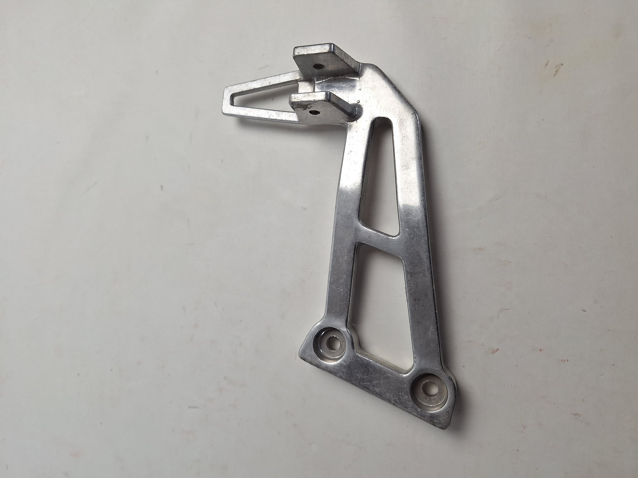 Bild von Honda NS 125 R2J HALTER FUSSRASTE 50750-KR1-860 HOLDER,L.PILLION